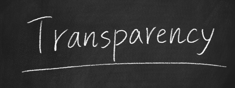 Transparency Chalkboard 'Transparency' written on a chalkboard with a line underneath.