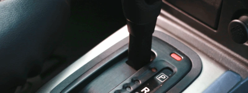 Semi-Automatic Gearstick (1) An overhead view of a semi-automatic gearstick.