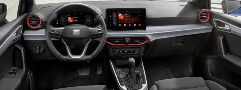 The interior of the 2025 Seat Arona, with the front cockpit in view.