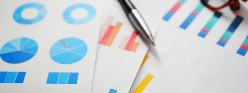 A close-up of documents with statistics and graphs on.
