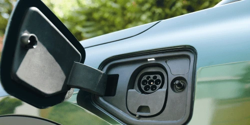 A close up of a car charging port.