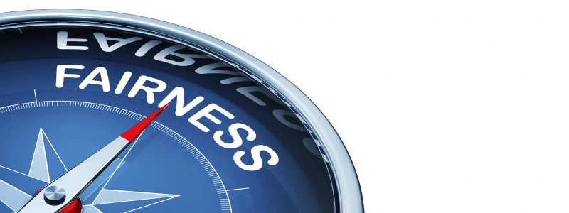 A compass pointing towards 'FAIRNESS'.