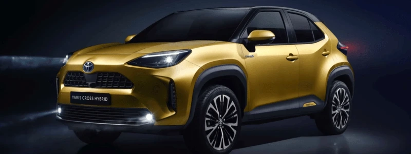 A gold Toyota Yaris Cross Hybrid.