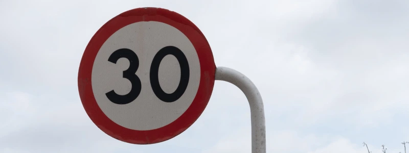 A close up of a 30 speed sign.