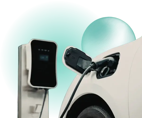 An EV car plugged in and charging with a blur and bubble behind it.