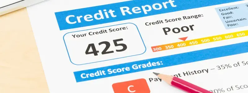 A close up of a poor credit scoring on a report.