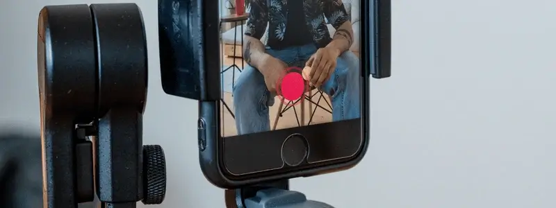 A close up of someone filming a TikTok video.