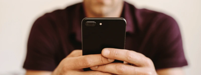 A person using a phone. 